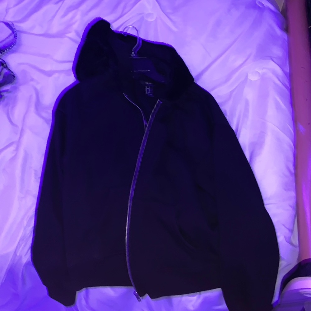 black jacket with fluffy hood